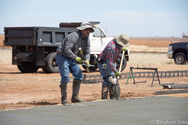 18.03.22_untitled_039-660web | Bingham Family Vineyards men poring concrete for barrel room
