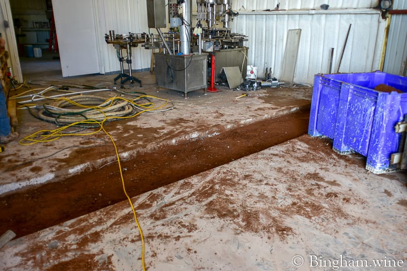 19.04.02_untitled_013-800web | Bingham Family Vineyards work on concert floors in winery at bingham family vineyards meadow Texas