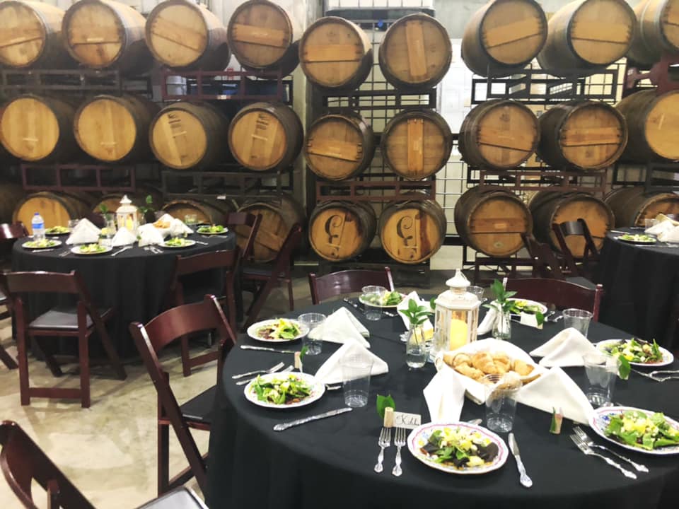 TessaButterfieldMeadowWineClubDinner07.27.19 | Bingham Family Vineyards table setting for bingham family vineyard wine club dinner barrel room meadow Texas