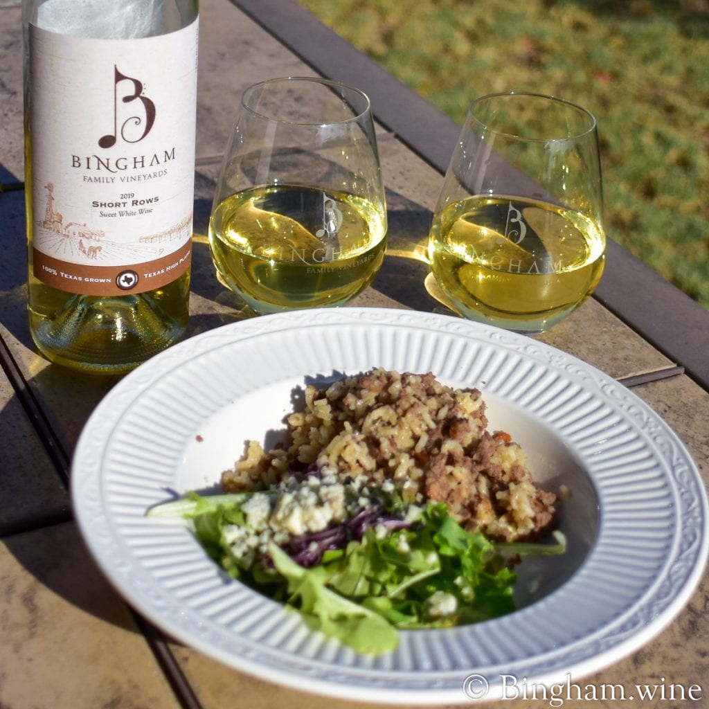 20.07.08_ShortRows.Popeyes.Rice_025.1200.web.1x1 | Bingham Family Vineyards dish of food with a bottle of bingham family vineyards 2019 short rows and wine glasses