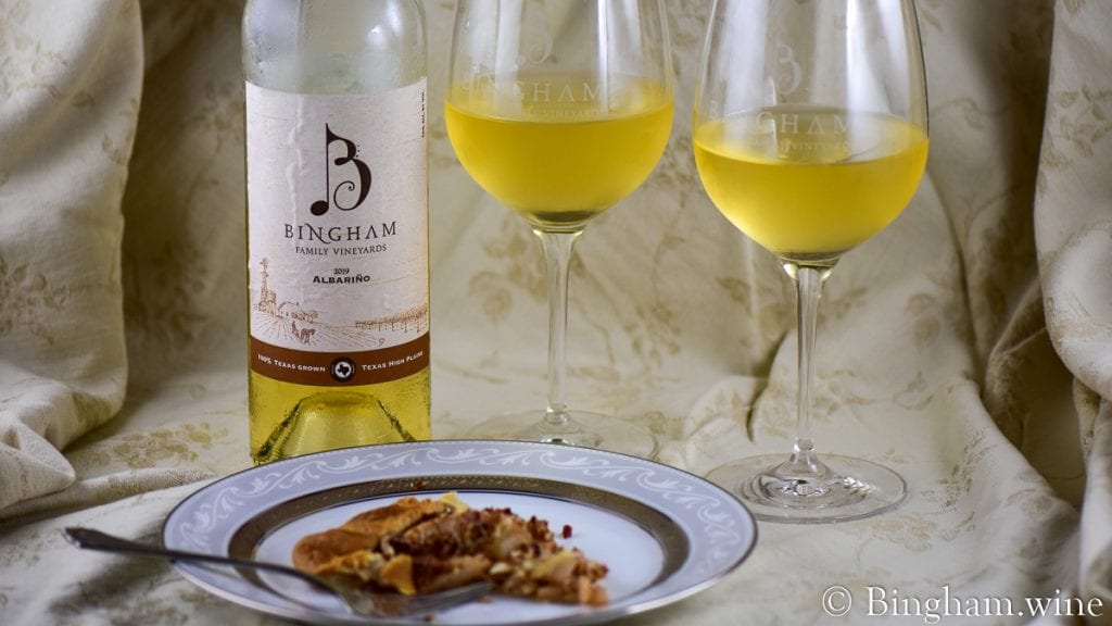 pear pecan pastry a bottle of bingham family vineyards 2019 Albarino and glasses of wine