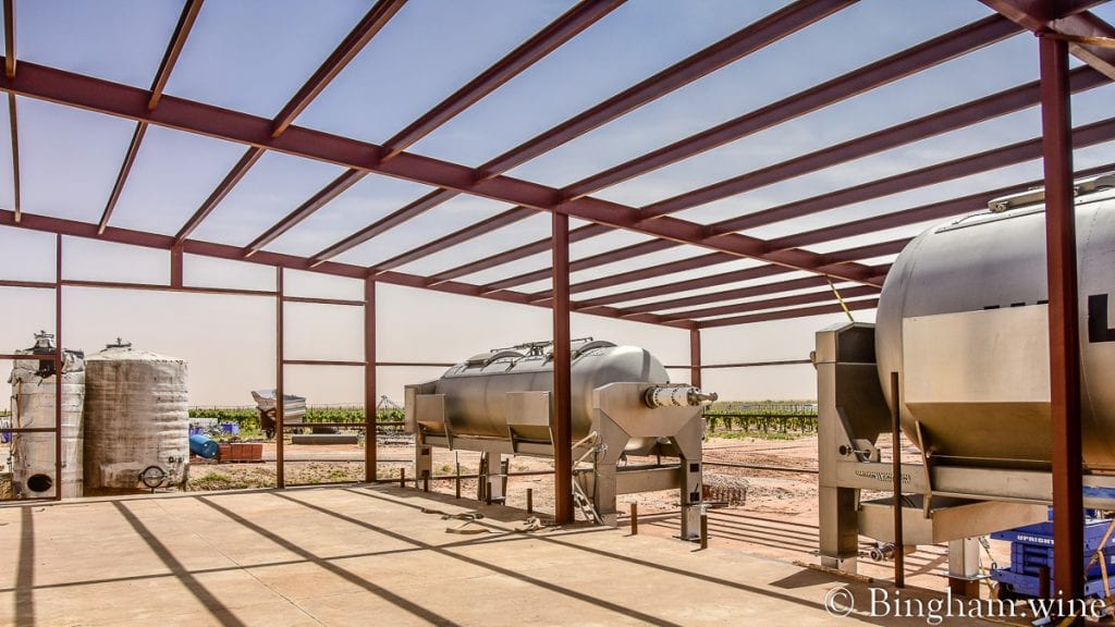 21.05.21_wineryfarmconstruction_003-1080-web-16x9-1 | Bingham Family Vineyards Framing out of building to cover two grape crush press machines at Bingham Family Vineyards.