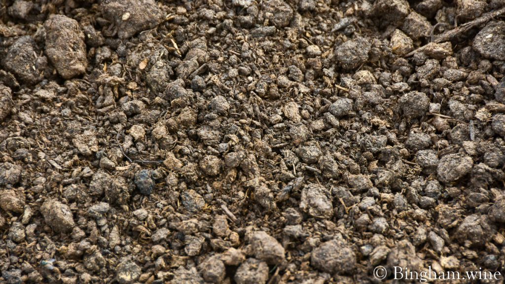 21.08.11_Compost_008-1200-web-16x9 | Bingham Family Vineyards Close up photo of compost at Bingham Organic Farms.