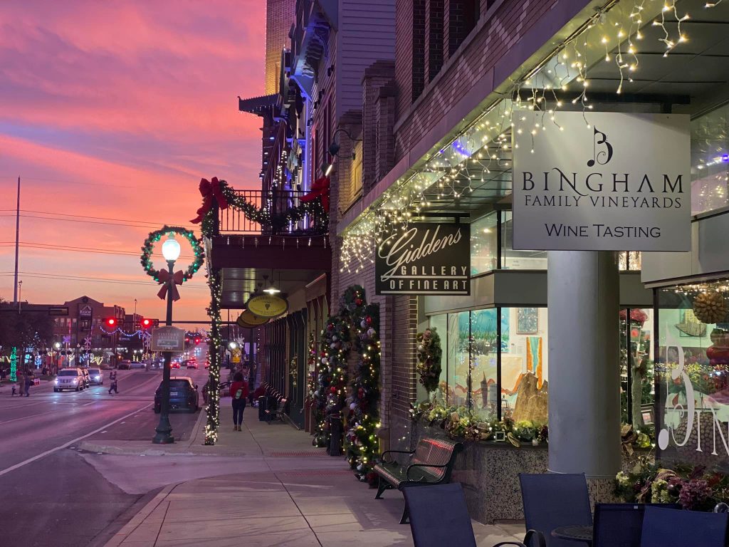 Exterior Bingham Family Vineyards at night with Christmas lights.
