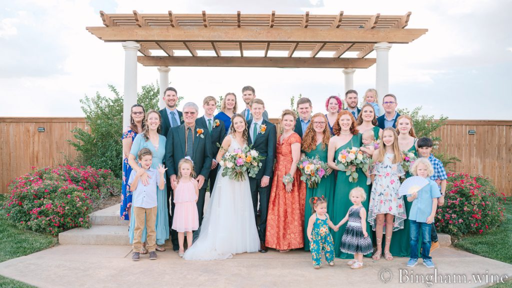 CarlsonWedding-523-1200-web-16x9-1 | Bingham Family Vineyards wedding photo with bride and groom and family