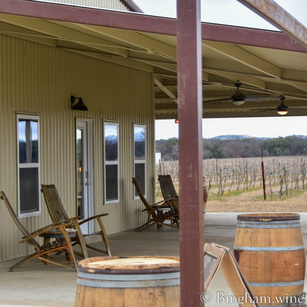 230128_HyeExterior_0031200web1x1 | Bingham Family Vineyards Porch of Bingham Family Vineyards, Hye, Texas, tasting room.