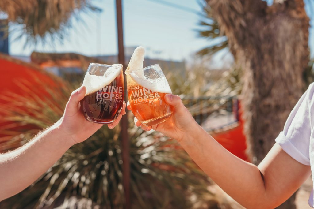 TexasWineHopsAndShops_Promo_2022-02-21 at 125443 PM 20 | Bingham Family Vineyards two glasses clicking at Texas Wine, Hops & Shops, Wine & Beer Festival, April 20th 2024