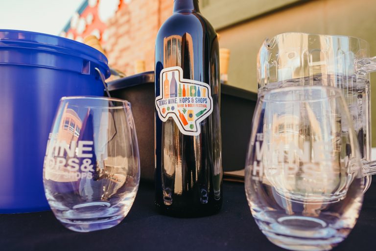 bottle of wine and glass from Texas Wine, Hops & Shops, Wine & Beer Festival, April 22nd 2023