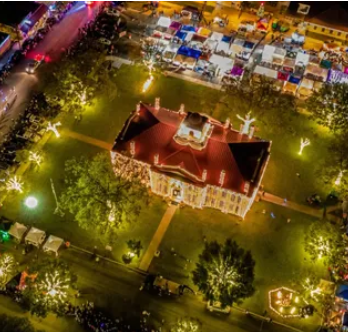 light spectacular 3 | Bingham Family Vineyards Building with Christmas lights. Johnson City, Texas. Light Spectacular