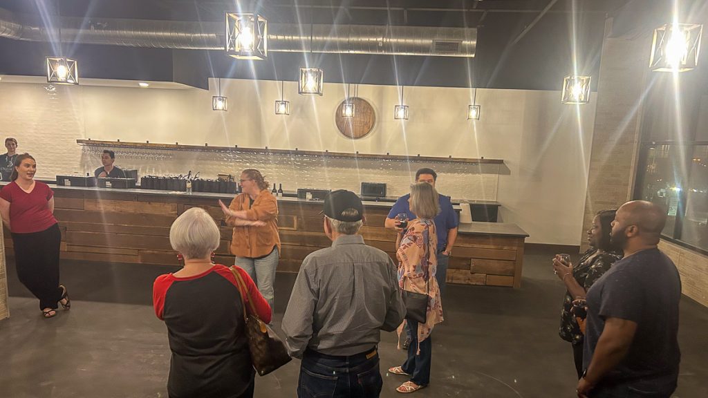 People enjoying a sneak preview of Bingham Family Vineyards, Roanoke, Texas, location