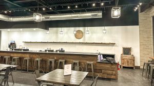 bar area and tables at Bingham Family Vineyards tasting room at Roanoke, Texas
