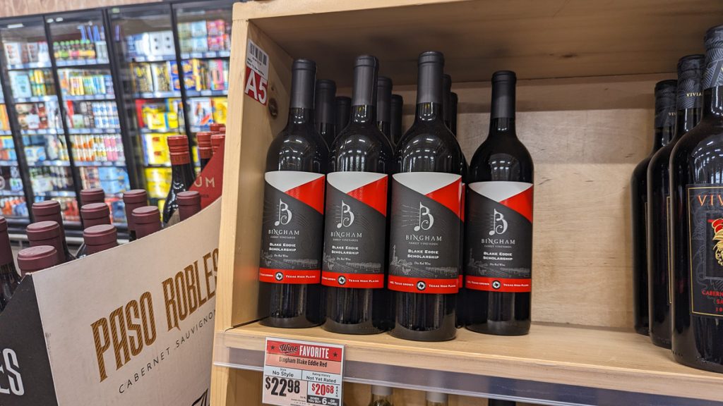04112024-1200-web-16x9-002 | Bingham Family Vineyards Blake Eddie Scholarship wine bottles on shelf at HEB in Lubbock, Texas