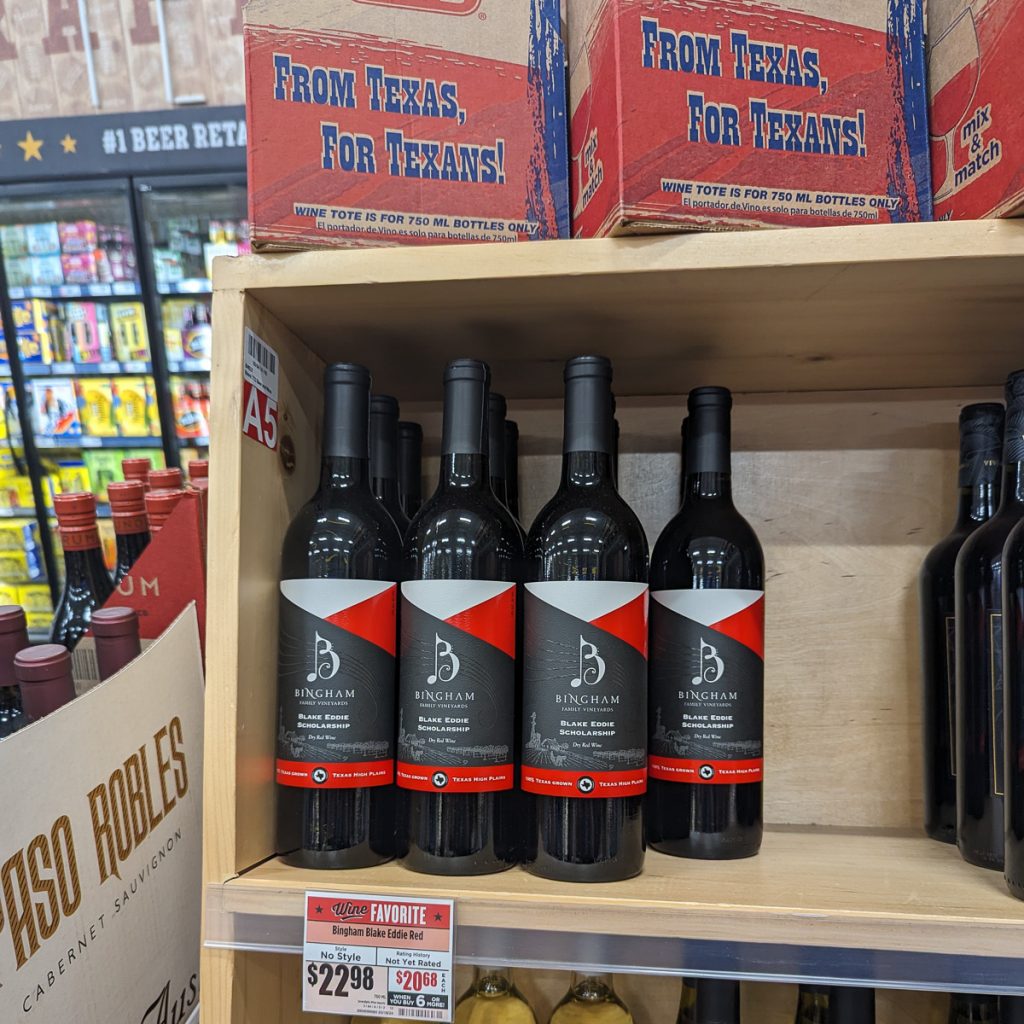 041120241200web1x1-001 | Bingham Family Vineyards Blake Eddie Scholarship wine bottles on shelf at HEB in Lubbock, Texas