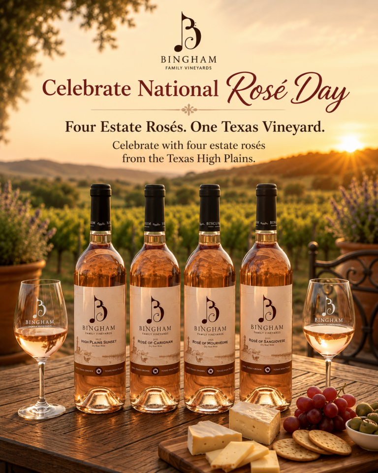 Celebrate National Rose' Day with Bingham Family Vineyards, four bottles lined up with a sunset in the background and cheese an fruit plate in front.