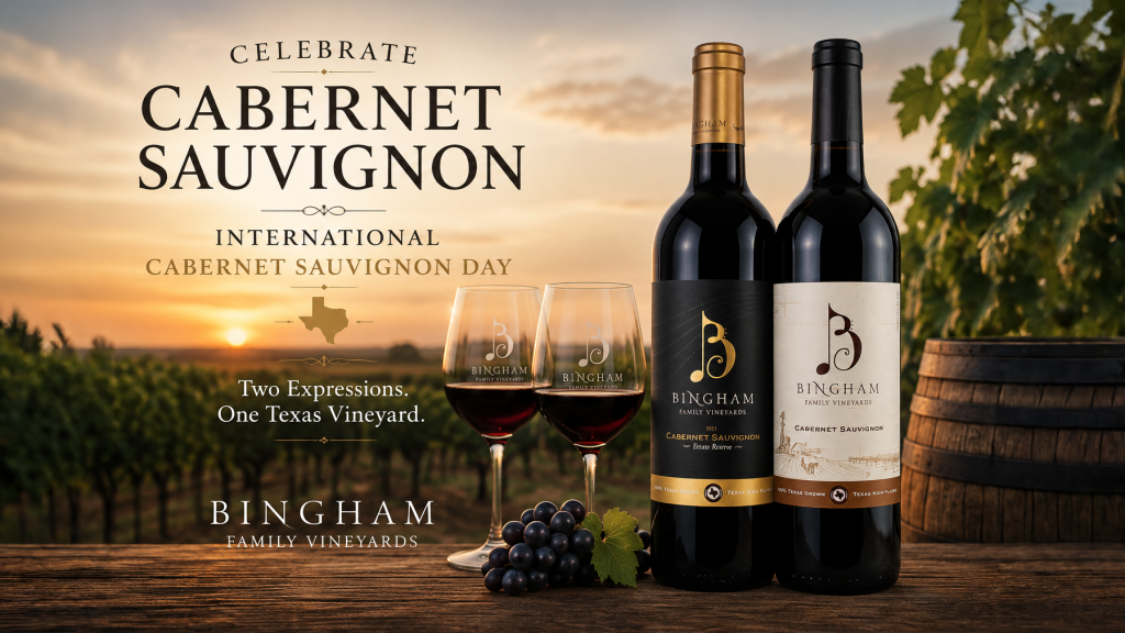 Bingham Family Vineyards Cabernet Sauvignon wines overlooking a Texas vineyard at sunset for International Cabernet Sauvignon Day.